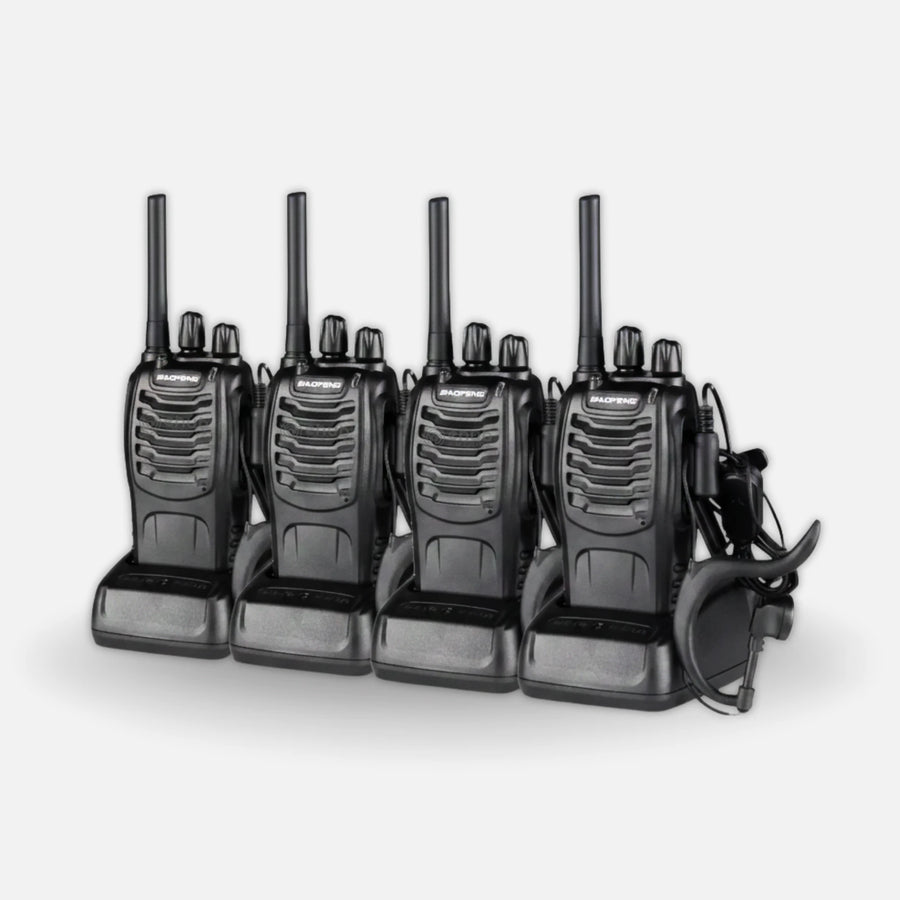 Set of 4 black walkie-talkies on a white background